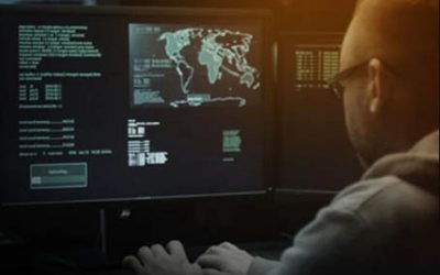 A security analyst monitors multiple screens displaying global network activity and data analytics, symbolizing advanced security measures and data protection.