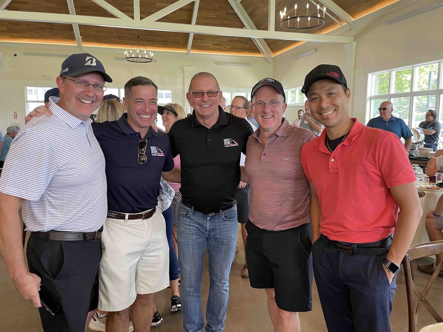 Group photo of the PTP team with Anthony Spadaro at the Robert Irvine Foundation Golf Charity Classic event.